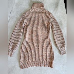 Lush wool, polyester, acrylic sweater dress. Size small. Color: multi light pink